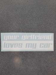 Naklejka YOUR GIRLFRIEND LOVES MY CAR 15cm biała